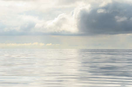 Beautiful water scape scene with cloudsの写真素材