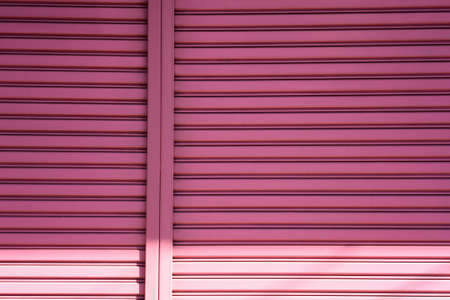 Pink Steel door texture backgroundの写真素材