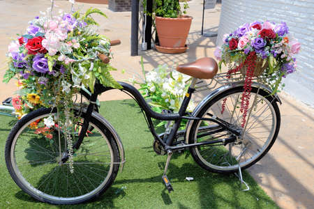Bicycle with flower on basket  Bicycle with flowerの写真素材