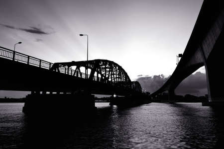 Black and White bridge across a Chao Phraya river