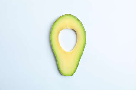 Fresh avocado slice on white background, space for text. Top view