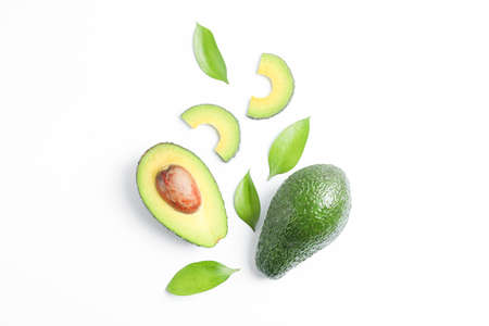 Flat lay composition with ripe avocados on white background, space for text. Top viewの写真素材