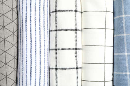 Rolled up fabric napkins as background, space for text