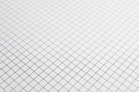 Sheet of notebook with grid texture as background, space for textの写真素材