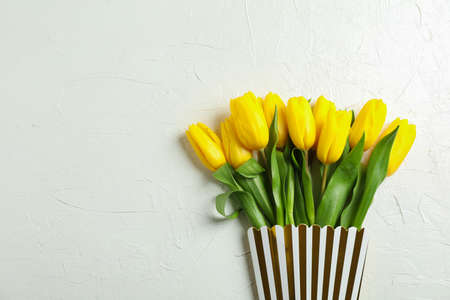 Bouquet of beautiful tulips in gift box, space for textの写真素材