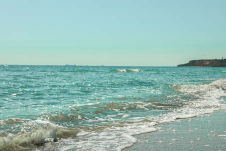 Blue sea water surface against sky. Space for text
