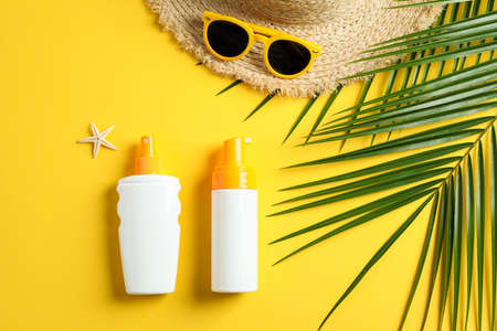 Summer vacation composition on yellow background. Space for text, top viewの写真素材
