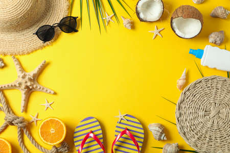 Flat lay composition with summer vacation accessories on color background, space for text and top...