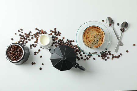 Flat lay composition with coffee time accessories on white background, space for text and top viewの写真素材