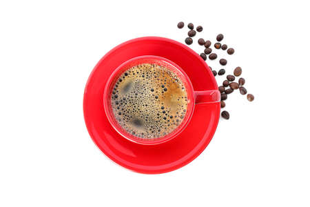 Red cup of coffee with coffee beans isolated on white background, top view. Coffee time accessories