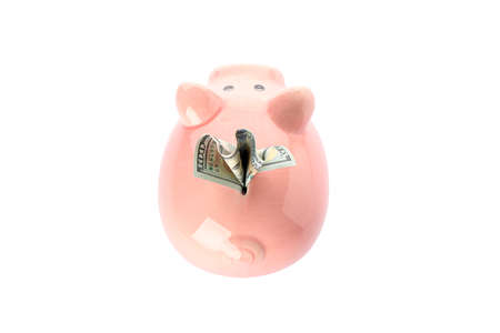 Happy piggy bank with money isolated on white background, top view. Finance, saving moneyの写真素材