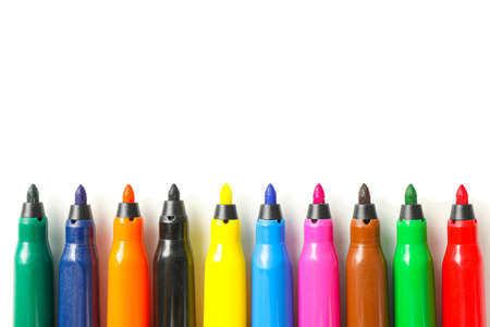 Color markers isolated on white background, closeup
