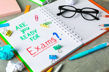 Composition with school supplies on grey background, space for textの写真素材