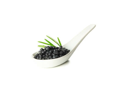 Glass spoon with caviar isolated on white backgroundの写真素材