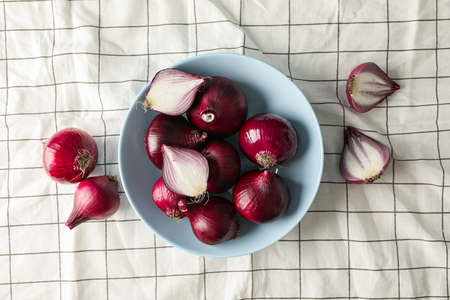 Flat lay composition with red onion on towel backgroundの写真素材