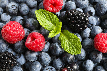 Heap of fresh berries as background, close up