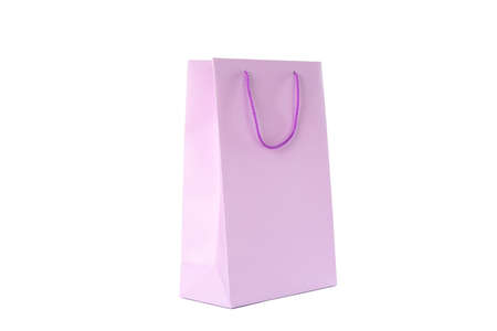 Purple paper bag isolated on white backgroundの写真素材