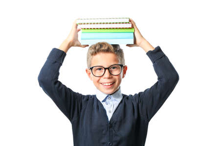 Boy with glasses and copybooks isolated on white backgroundの写真素材