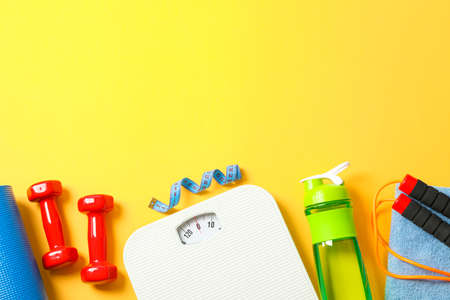 Flat lay composition with loss weigh accessories on color backgroundの写真素材