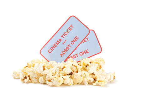 Popcorn pile with tickets isolated on white background, close upの写真素材