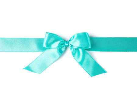 Turquoise ribbon with bow isolated on white background. Gift conceptの写真素材