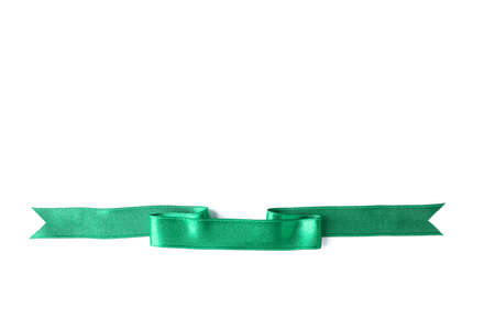Green ribbon isolated on white background. Gift conceptの写真素材