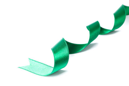 Green ribbon isolated on white background. Gift conceptの写真素材