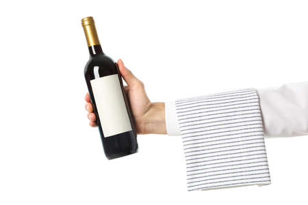 Male hand holding bottle of wine, isolated on white backgroundの写真素材