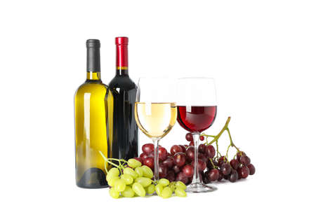 Grapes, bottles and glasses with wine isolated on white backgroundの写真素材