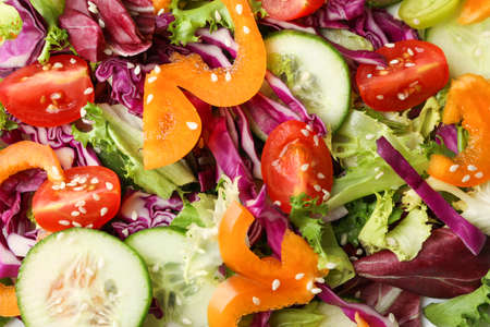 Fresh salad with sesame on whole background, close upの写真素材