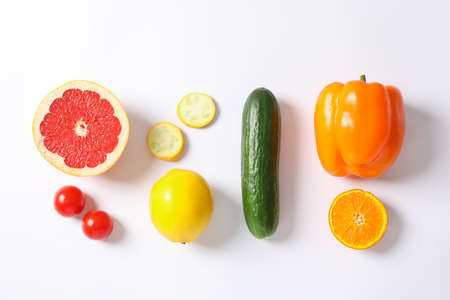 Flat lay with vegetables and fruits on white background, space for textの写真素材