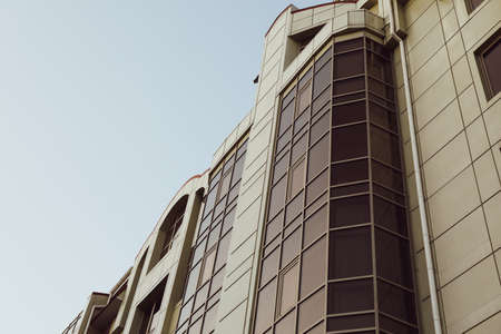 Beautiful building against blue sky, space for text