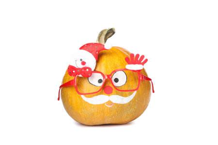 Pumpkin with mustache and red glasses isolated on white backgroundの写真素材