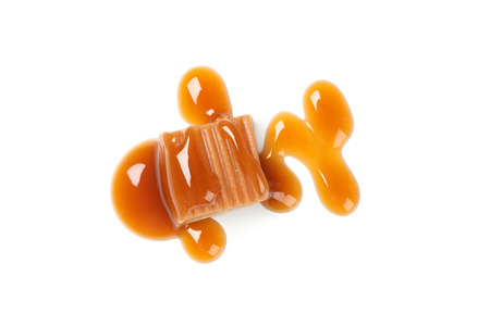 Caramel candy with sauce isolated on white backgroundの写真素材