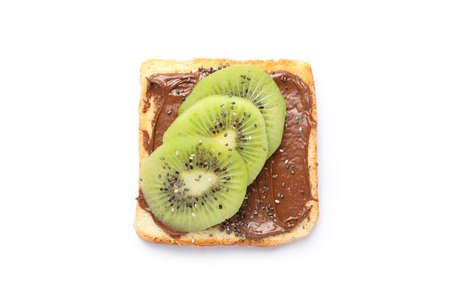 Toast with chocolate cream, kiwi and chia isolated on white backgroundの写真素材