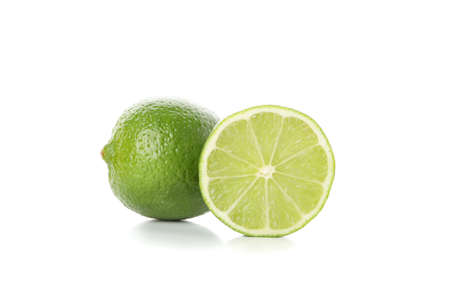 Fresh limes isolated on white background, close up
