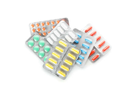Bunch of pills in blister pack isolated on white background