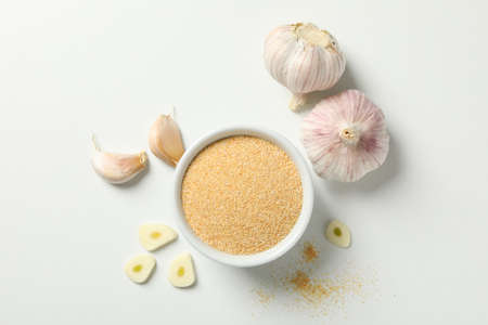 Garlic powder and ingredients on white background, top viewの写真素材