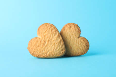 Heart shaped cookies on blue background, close upの写真素材