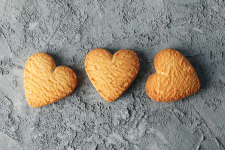 Heart shaped cookies on grey background, space for textの写真素材