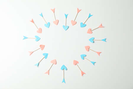 Heart made of multicolored arrows on white background, space for textの写真素材