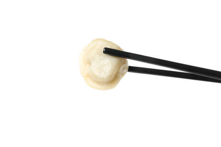 Chopsticks with dumpling isolated on white backgroundの写真素材