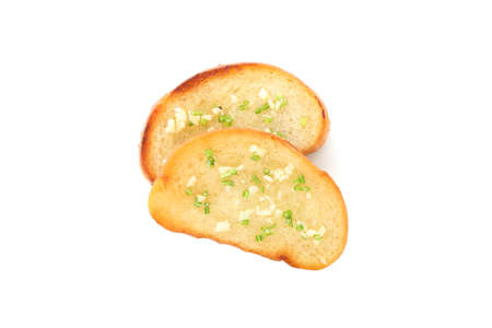 Toasted bread slices with garlic isolated on white backgroundの写真素材