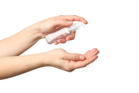 Hand holding antiseptic antibacterial disinfectant isolated on white background. Coronavirus...