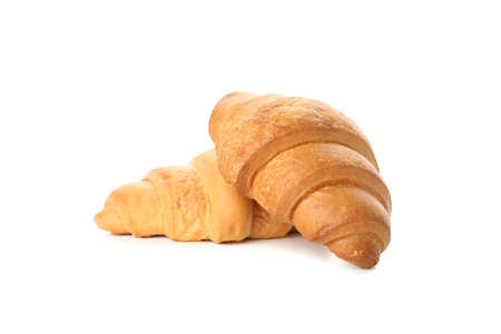 Freshly baked croissants isolated on white backgroundの写真素材