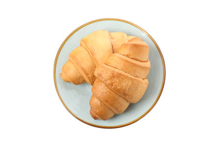 Plate with croissants isolated on white backgroundの写真素材