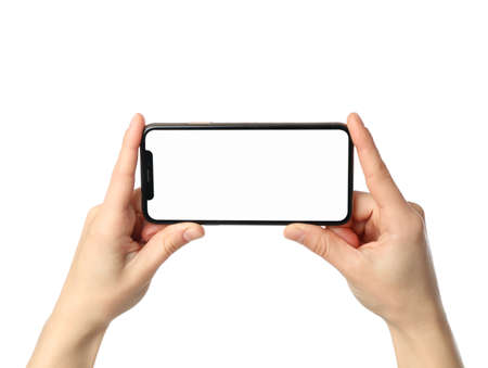 Female hands holding phone with empty screen, isolated on white background