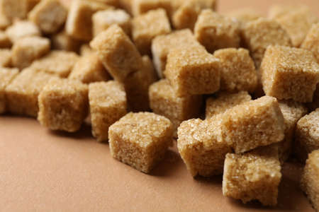 Many sugar cubes on craft background, close upの写真素材