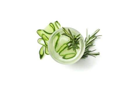 Glass with infused cucumber water isolated on white backgroundの写真素材