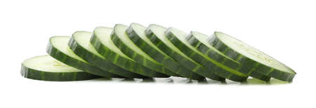 Fresh cucumber slices isolated on white backgroundの写真素材